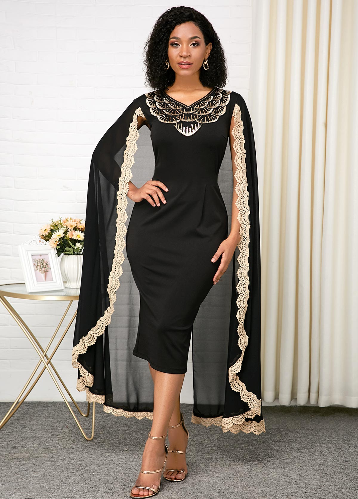 black gown with cape
