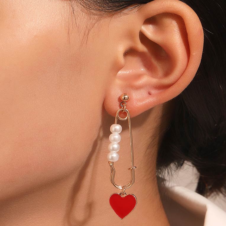 Boucles d'oreilles en alliage de conception de coeur d'or de perle