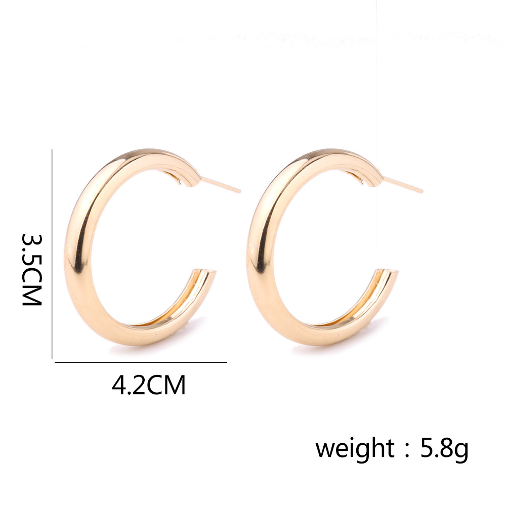 Gold jewelry,Geometric jewelry,Round Geometric Pattern Metal Detail Gold Earrings