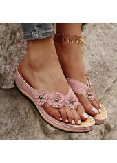 rosafarbene Flip-Flops mit niedrigem Absatz und offener Zehenpartie