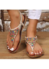 Beigefarbene Flip-Flops mit offener Zehenpartie