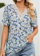 Hellblaue Patchwork-Bluse mit Blumendruck und V-Ausschnitt