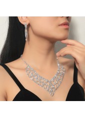 boucles d'oreilles et collier en argent avec pompon en strass