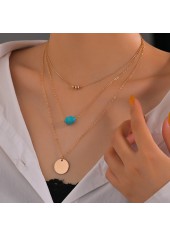 Goldkette mit Perlen und Metalldetail im Lagendesign