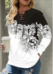 Rotita-Langarm-Sweatshirt mit Ösen-Blumenmuster in Schwarz mit Wasserfallausschnitt