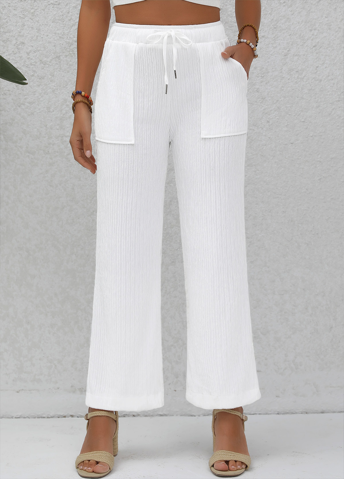 Pantalon taille haute blanc à double poches latérales taille élastique