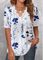 blouse à col en V bleu foncé à imprimé floral et broderie rotita