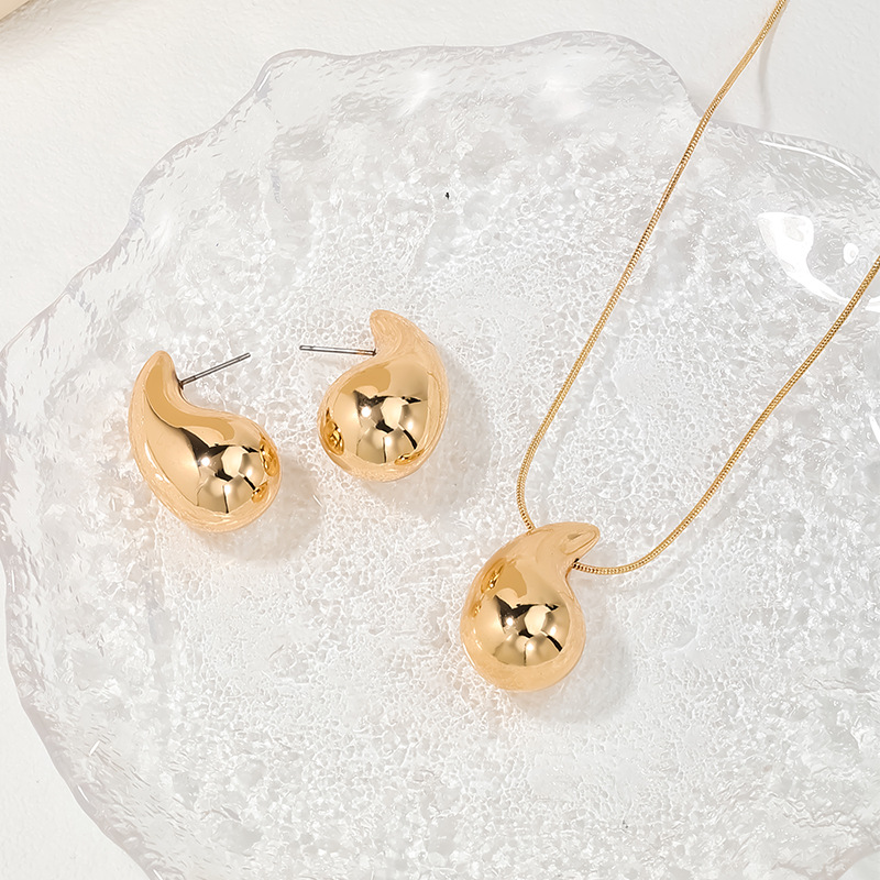 Gold Plastic Teardrop Design Earrings Set