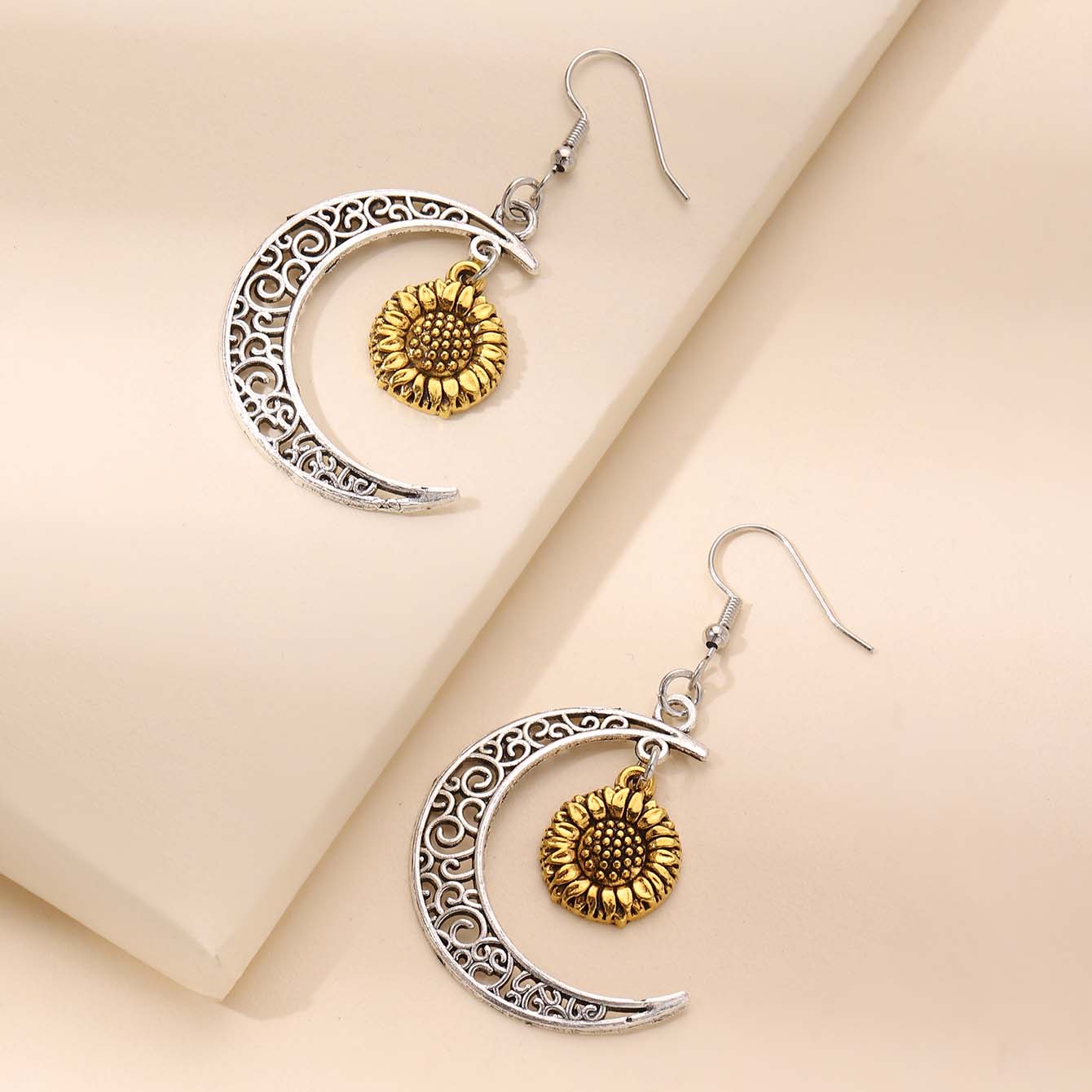 Silvery White Sunflower Hollow Alloy Earrings
