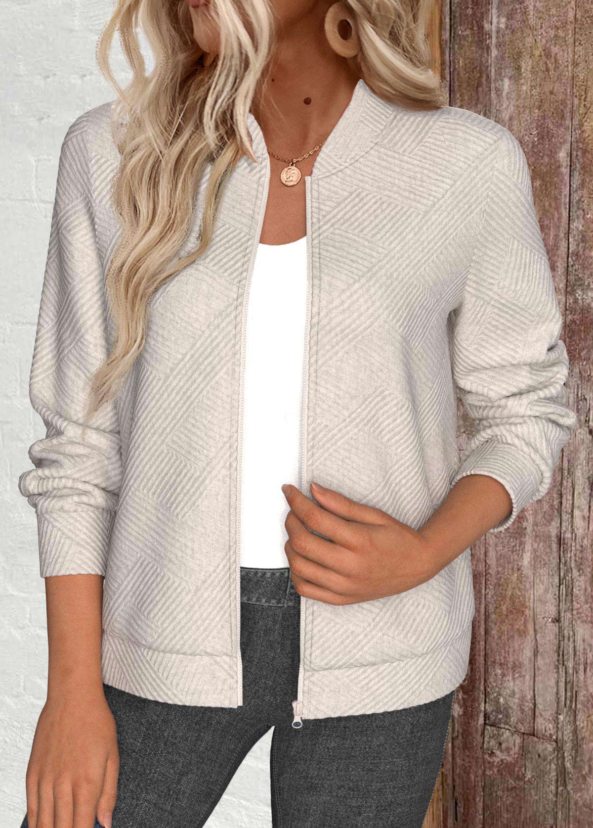 veste à manches longues et col montant en tissu texturé beige rotita