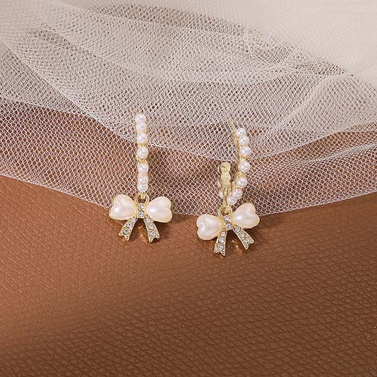 Golden Alloy Pearl Bowknot Design Earrings