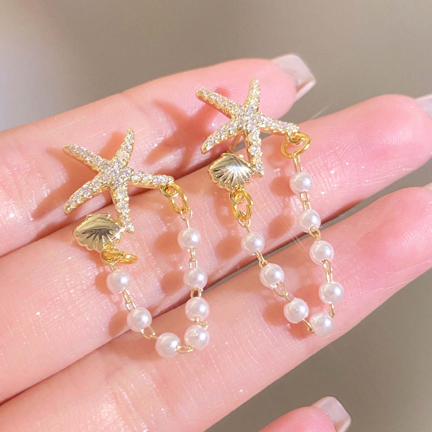 boucles d'oreilles en cuivre doré avec perles et coquillages d'étoiles de mer
