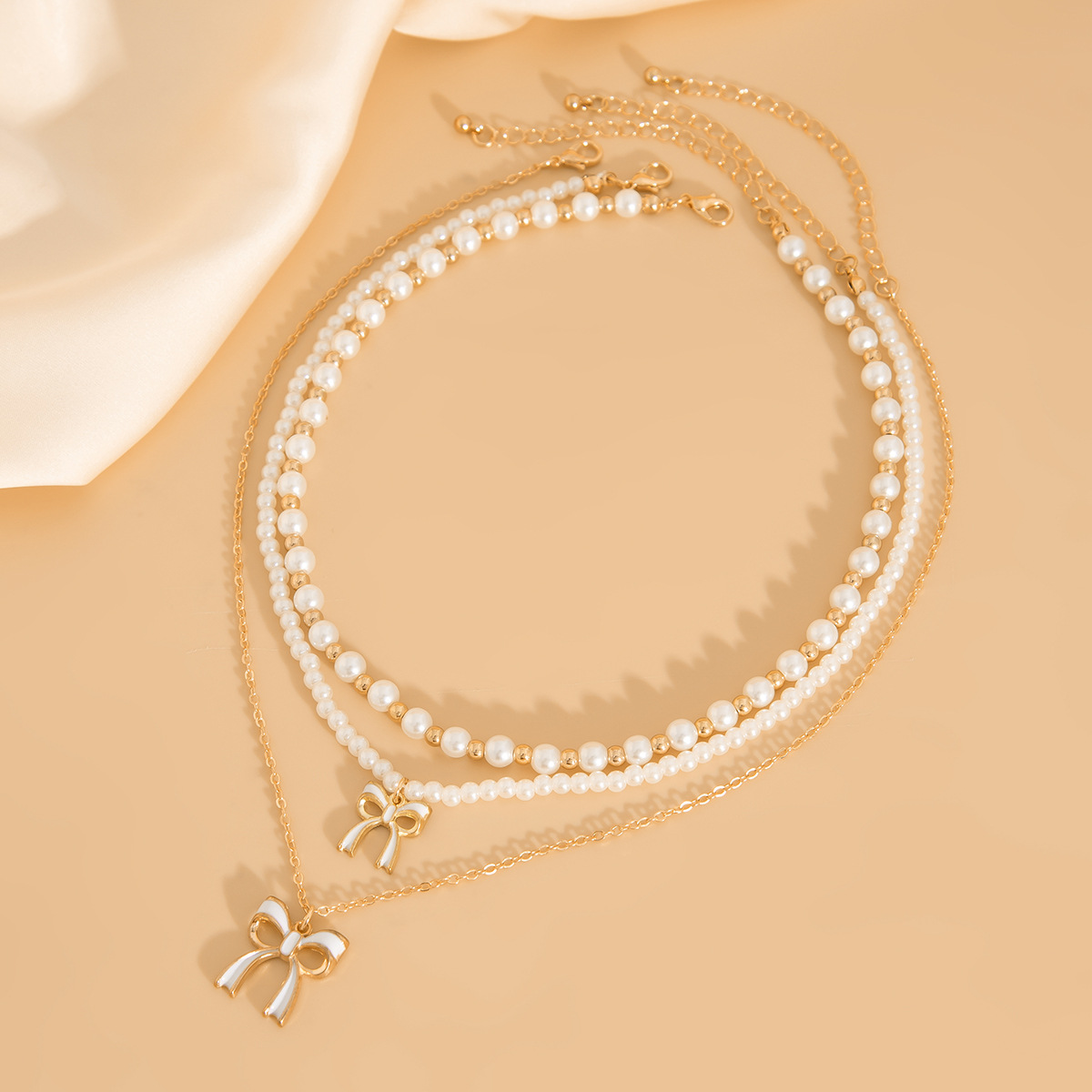 Golden Color Alloy Detail Bow Necklace