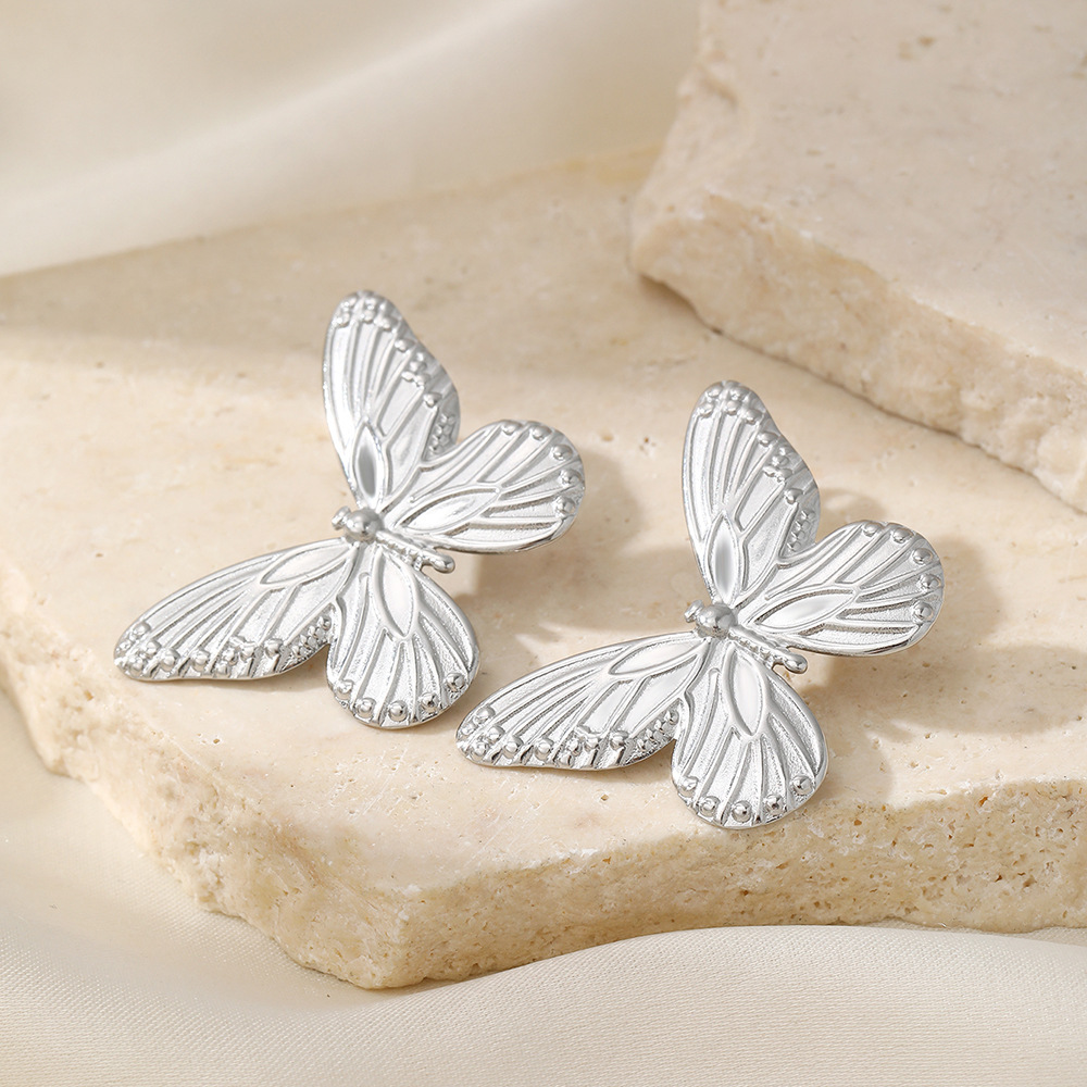 boucles d'oreilles papillon en acier inoxydable argenté et animal