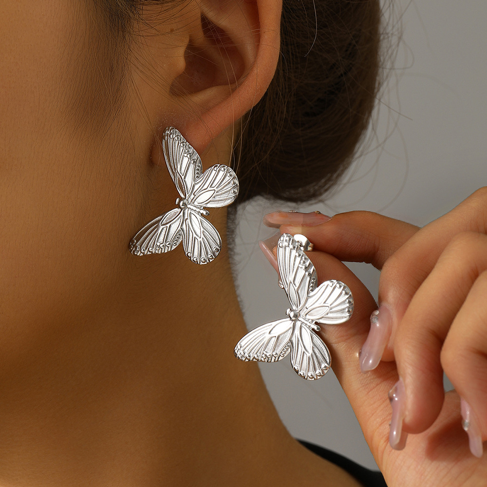 boucles d'oreilles papillon en acier inoxydable argenté et animal