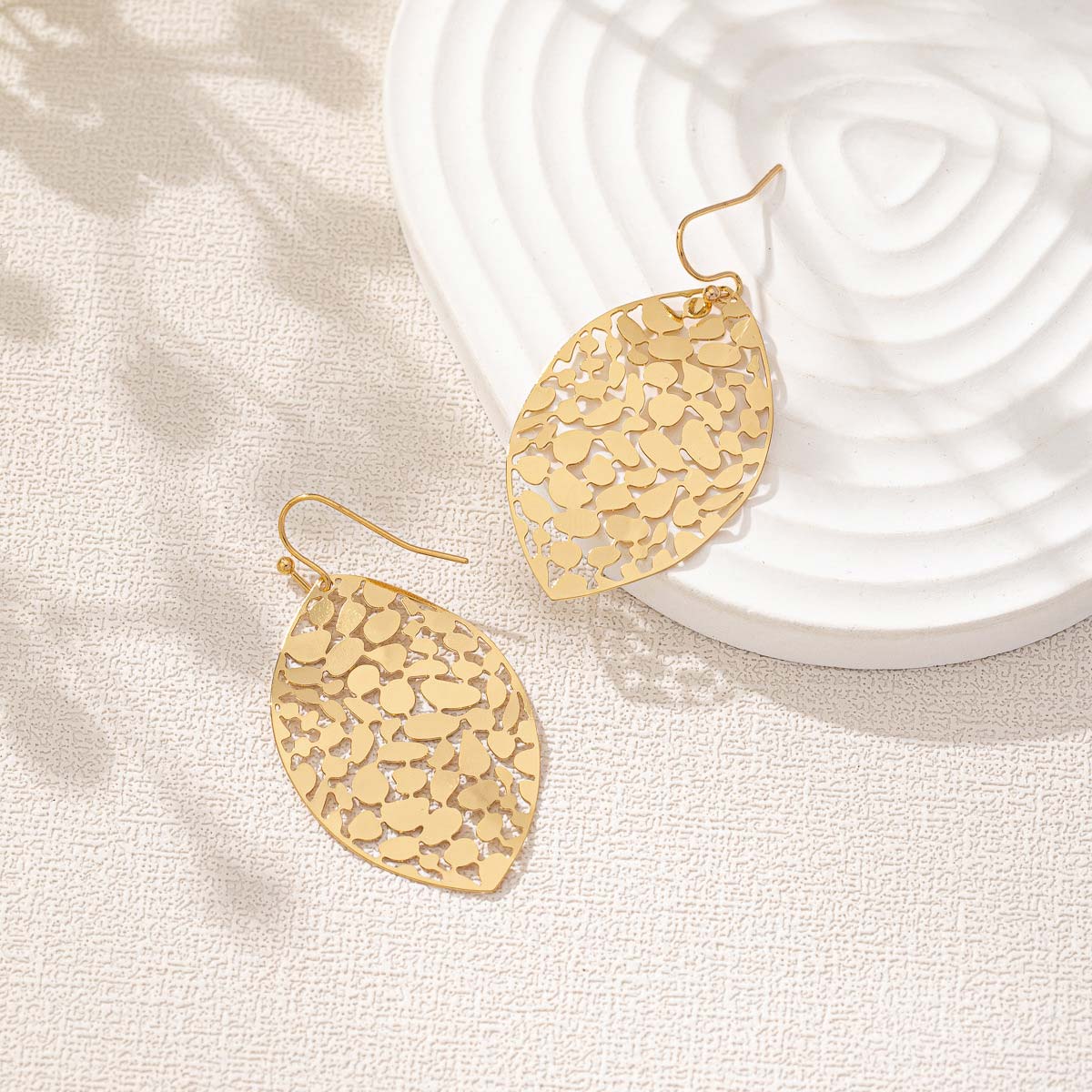 Golden jewelry,Leaf Design Hollow Golden Alloy Earrings