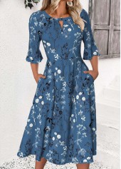Rotita – Kleid mit Blumendruck und pfauenblauem Rundhalsausschnitt und 3/4-Ärmeln
