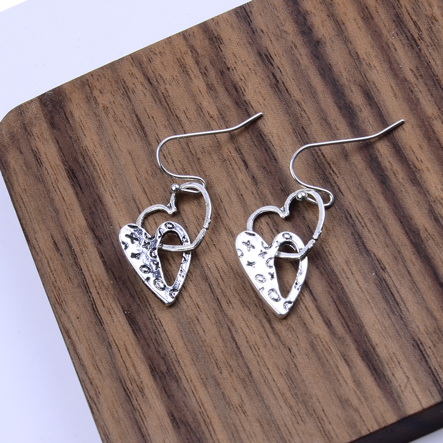 Silver jewelry,Heart jewelry,Heart Design Silver Hollow Alloy Earrings