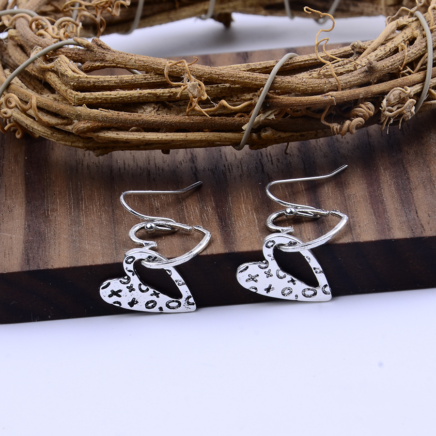 Silver jewelry,Heart jewelry,Heart Design Silver Hollow Alloy Earrings