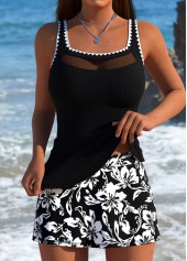 Schwarzer Tankini mit Blumenmuster und mittelhohem Bund der den Bauch bedeckt