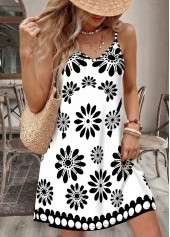 kurzes Kleid von Rotita mit weißem Blumenmuster das den Bauch bedeckt und einen V-Ausschnitt hat