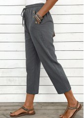 pantalon gris à jambes droites et taille haute élastique