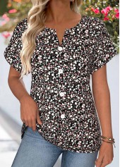 schwarze Bluse mit V-Ausschnitt und dezentem Blumenmuster die den Bauch bedeckt
