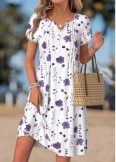 kurzes Kleid von Rotita mit weißem Blumenmuster Ziernähten und Schlitzkragen