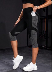 Schwarze eng anliegende Sporthose mit hohem Bund und elastischem Bund
