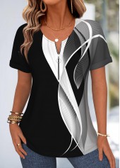schwarzes T-Shirt mit Rundhalsausschnitt und geometrischem Muster das den Bauch bedeckt