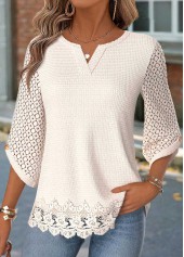Rotita Bluse mit geschwungenem Saum beigefarbenem V-Ausschnitt und 3/4-Ärmeln sowie abgerundetem Saum.