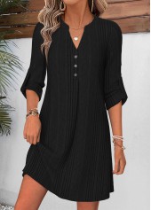 Rotita schwarzes Kleid mit Bauchbedeckung kurzem Schlitzkragen und langen Ärmeln
