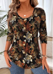 schwarzes T-Shirt mit Rundhalsausschnitt und Blumenmuster abgerundetem Saum