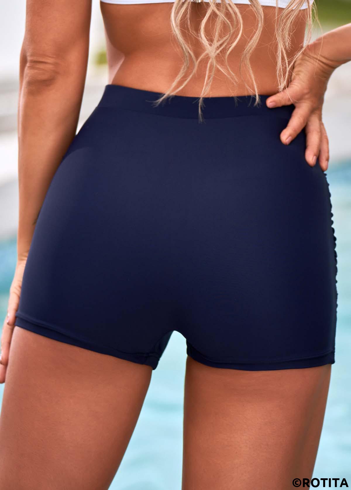 Rotita – gerüschte Badeshorts in Marineblau mit hoher Taille