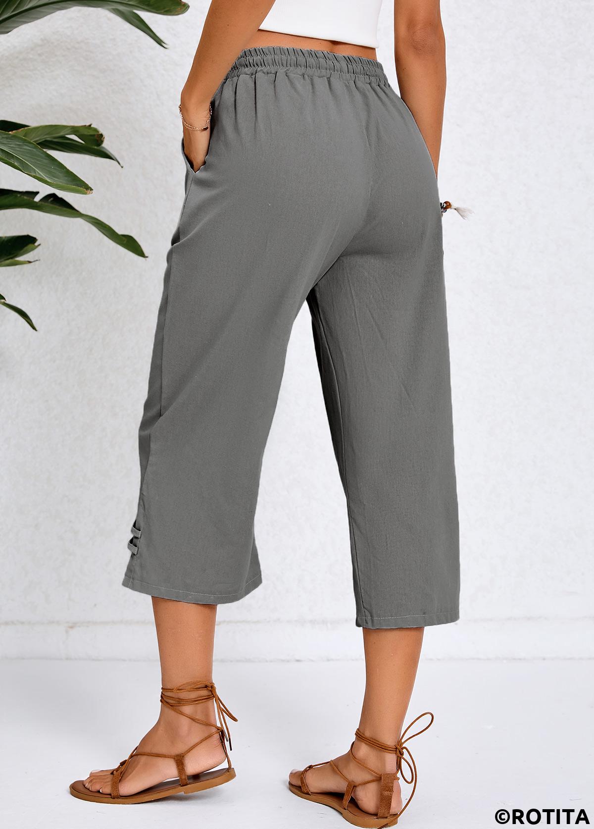Dunkelgraue Hose mit hoher Taille und elastischem Bund und Tasche