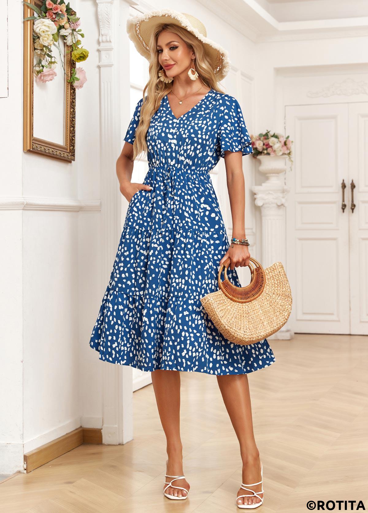 robe bleue en jean à imprimé floral et petites poches col en V