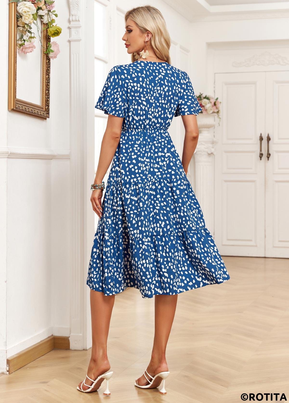 robe bleue en jean à imprimé floral et petites poches col en V